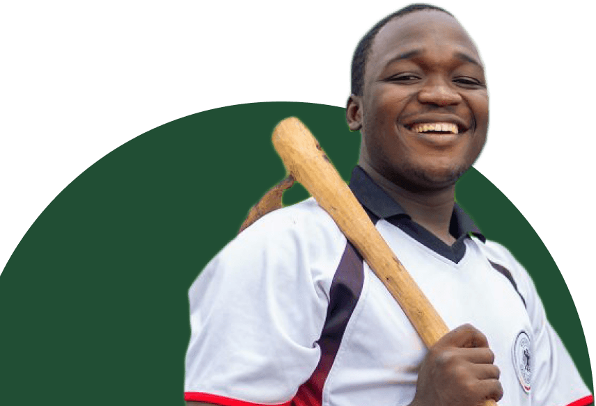 farmer with hoe smiling looking at the camera